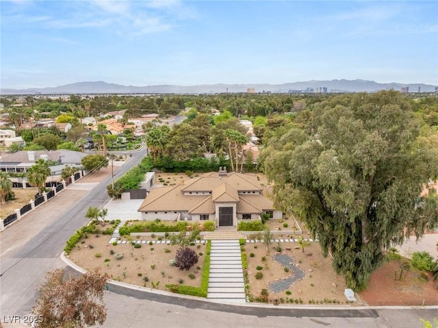 drone / aerial view with a residential view and a mountain view