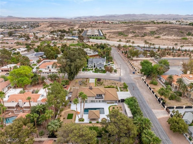 aerial view featuring a mountain view and a residential view