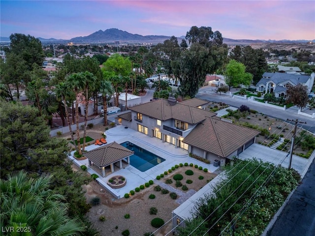 drone / aerial view featuring a mountain view