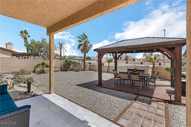 2111 River City Dr, Laughlin, NV 89029 - view of patio / terrace with a gazebo, a fenced backyard, and outdoor dining area