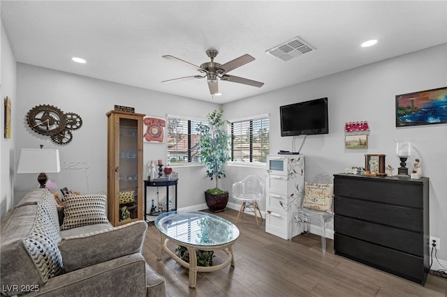 2111 River City Dr, Laughlin, NV 89029 - living room featuring a ceiling fan, recessed lighting, wood finished floors, and baseboards