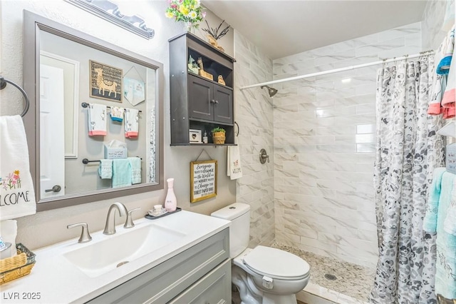 2111 River City Dr, Laughlin, NV 89029 - bathroom with a stall shower, vanity, and toilet