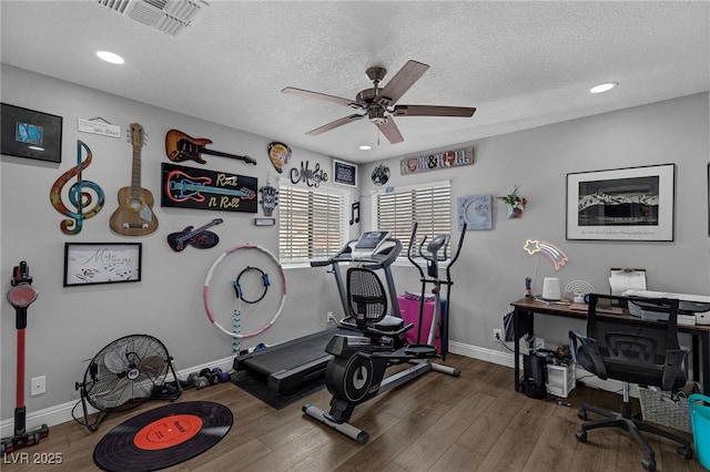 2111 River City Dr, Laughlin, NV 89029 - exercise room featuring ceiling fan, wood finished floors, a textured ceiling, baseboards, and recessed lighting