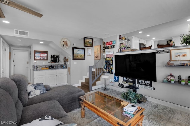 2111 River City Dr, Laughlin, NV 89029 - living room featuring wet bar, recessed lighting, stairway, baseboards, and wood finished floors