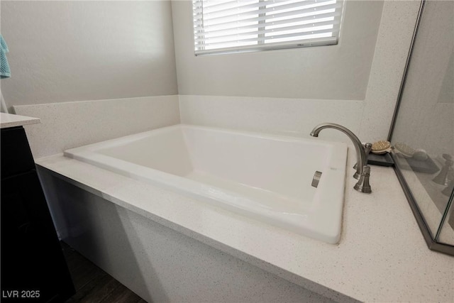 full bathroom featuring a garden tub