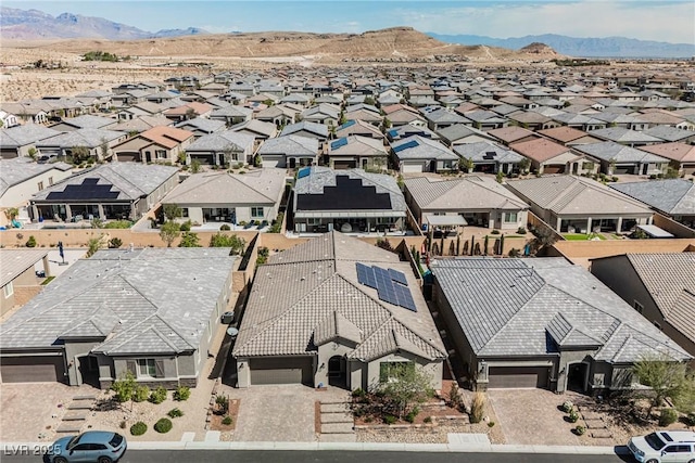 drone / aerial view featuring a mountain view and a residential view