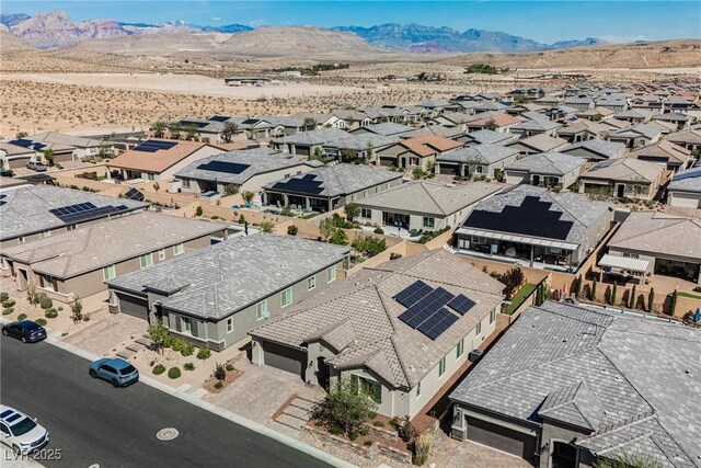 10126 Cliff Dwellings Ave, Las Vegas, NV 89178 - aerial perspective of suburban area featuring a mountainous background