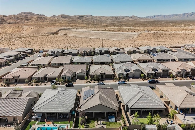 aerial view with a mountain view and a residential view