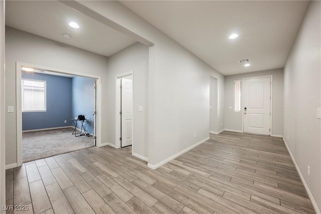 10126 Cliff Dwellings Ave, Las Vegas, NV 89178 - hall with light wood-style flooring and recessed lighting
