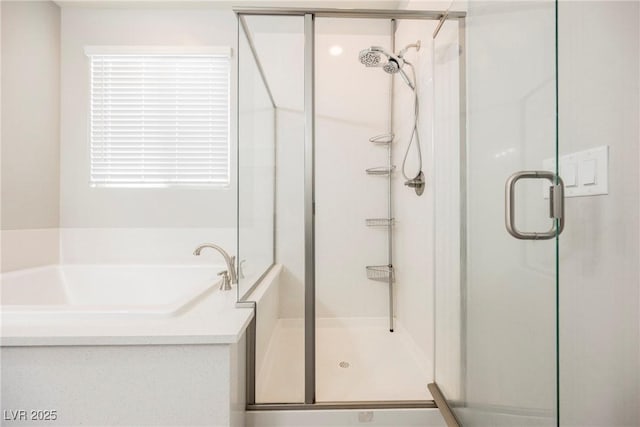 10126 Cliff Dwellings Ave, Las Vegas, NV 89178 - bathroom featuring a garden tub and a stall shower