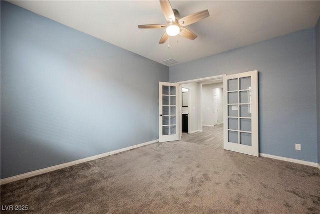 10126 Cliff Dwellings Ave, Las Vegas, NV 89178 - carpeted empty room featuring french doors and a ceiling fan