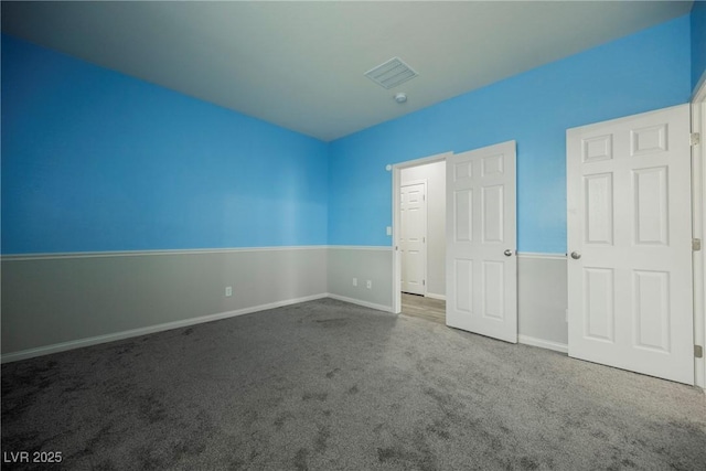 10126 Cliff Dwellings Ave, Las Vegas, NV 89178 - unfurnished bedroom featuring carpet floors and baseboards