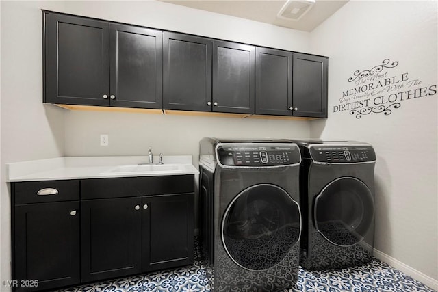 10126 Cliff Dwellings Ave, Las Vegas, NV 89178 - laundry area featuring cabinet space and washer and clothes dryer
