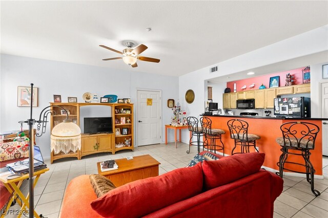 5855 Valley Dr Unit 1101, North Las Vegas, NV 89031 - living area featuring ceiling fan, visible vents, and light tile patterned floors