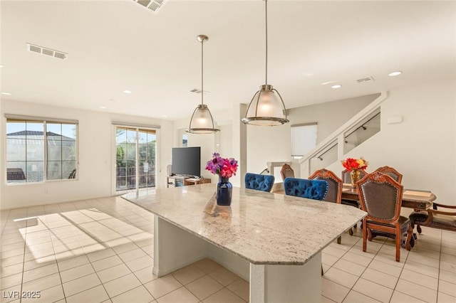 8276 Sorrel St, Las Vegas, NV 89139 - kitchen with recessed lighting, open floor plan, visible vents, and light tile patterned floors