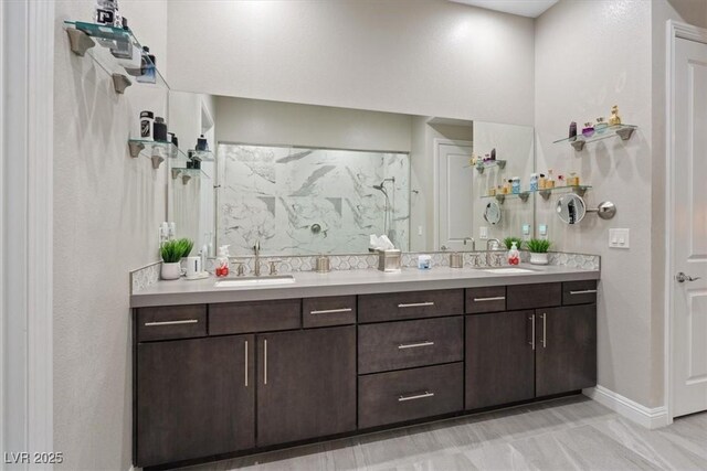 10018 Regency Square Ave, Las Vegas, NV 89148 - bathroom with double vanity and a marble finish shower