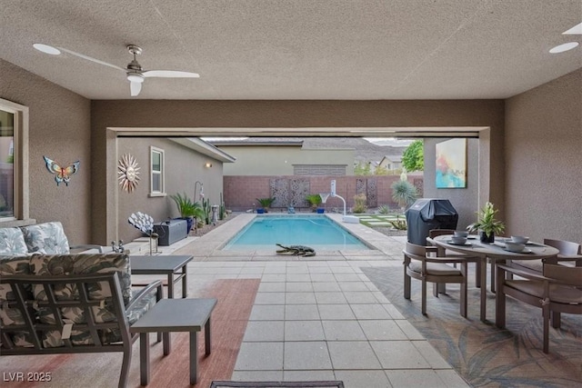 10018 Regency Square Ave, Las Vegas, NV 89148 - view of pool with a patio, a fenced backyard, a ceiling fan, and outdoor dining space