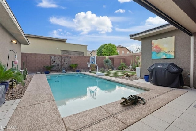 10018 Regency Square Ave, Las Vegas, NV 89148 - view of pool featuring area for grilling, a fenced backyard, and a patio area