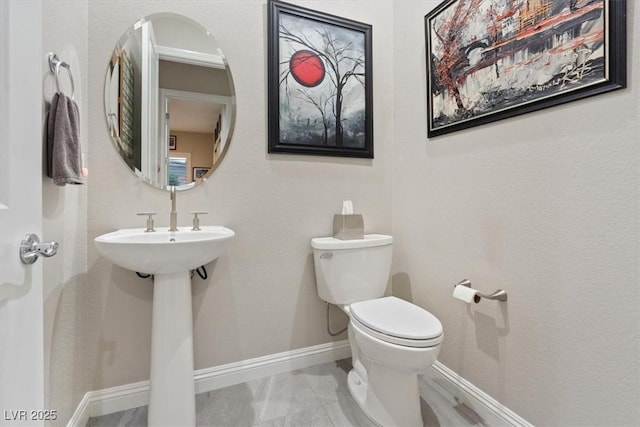 10018 Regency Square Ave, Las Vegas, NV 89148 - half bathroom with toilet and baseboards