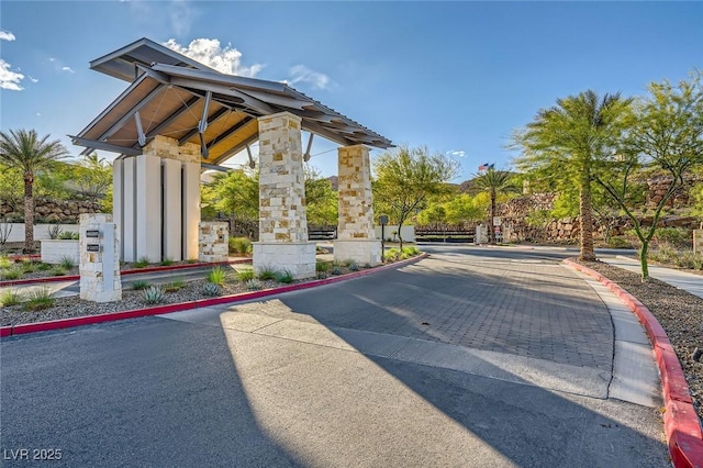 26 Sun Mirage Ave, Henderson, NV 89011 - view of road featuring a gated entry and curbs