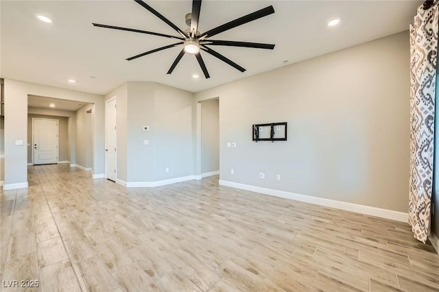 26 Sun Mirage Ave, Henderson, NV 89011 - unfurnished room featuring ceiling fan, baseboards, light wood-style floors, and recessed lighting