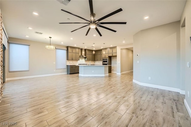 26 Sun Mirage Ave, Henderson, NV 89011 - unfurnished living room with light wood-type flooring, baseboards, visible vents, recessed lighting, and ceiling fan