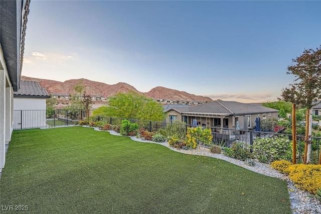 26 Sun Mirage Ave, Henderson, NV 89011 - view of yard featuring a fenced backyard and a mountain view