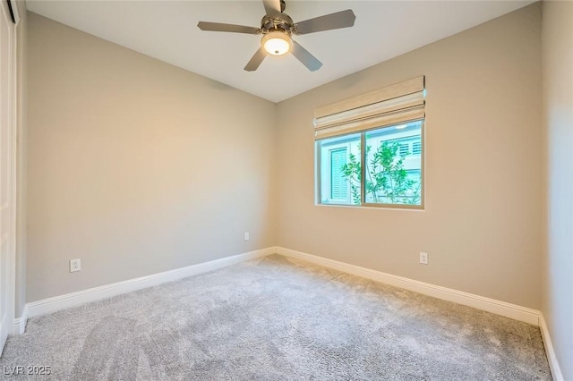 26 Sun Mirage Ave, Henderson, NV 89011 - spare room with baseboards, a ceiling fan, and carpet flooring