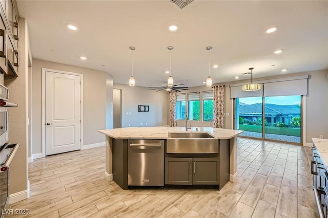 26 Sun Mirage Ave, Henderson, NV 89011 - kitchen featuring a sink, baseboards, light stone countertops, dishwasher, and wood finish floors