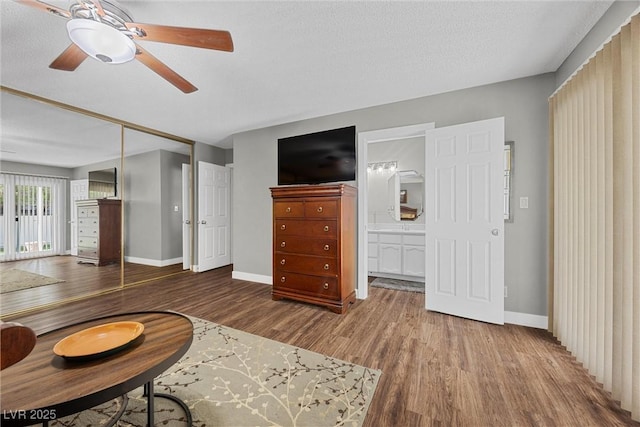 1619 Abby Ave, Henderson, NV 89014 - living room featuring a ceiling fan and wood finished floors