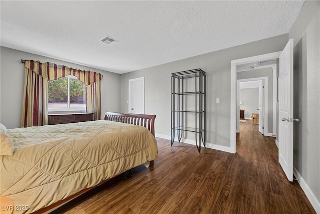 1619 Abby Ave, Henderson, NV 89014 - bedroom featuring wood finished floors and a textured ceiling