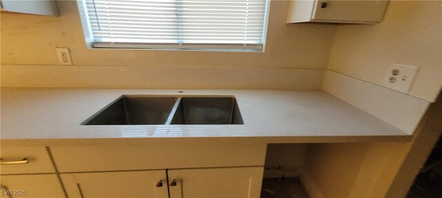 2740 Vita Dr, North Las Vegas, NV 89030 - kitchen with light countertops and a wealth of natural light