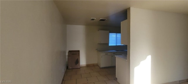 2740 Vita Dr, North Las Vegas, NV 89030 - hall featuring visible vents and light tile patterned floors