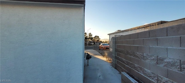 2740 Vita Dr, North Las Vegas, NV 89030 - view of side of property featuring stucco siding and fence