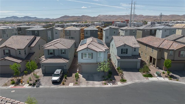 bird's eye view with a mountain view and a residential view
