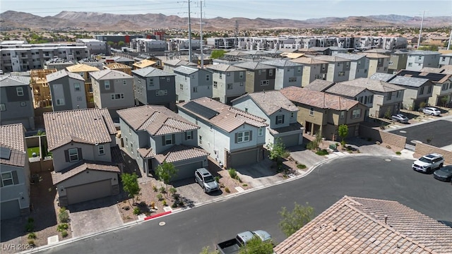 bird's eye view with a residential view and a mountain view