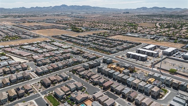 aerial view featuring a residential view and a mountain view