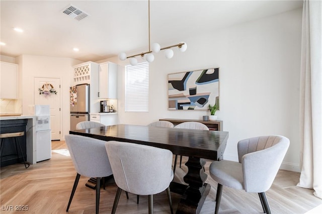dining area with recessed lighting and visible vents