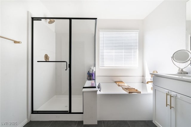 full bathroom featuring a bath, tile patterned floors, vanity, and a shower stall