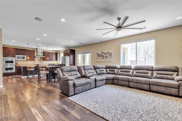 10412 Deer Heights St, Las Vegas, NV 89178 - living area with a ceiling fan, recessed lighting, and dark wood-type flooring