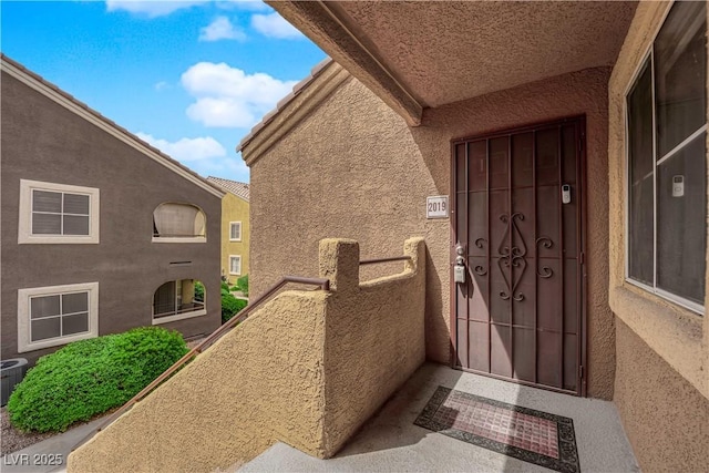 7950 W Flamingo Rd Unit 2019, Las Vegas, NV 89147 - entrance to property with stucco siding and a balcony