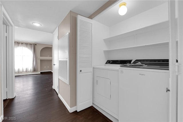 7950 W Flamingo Rd Unit 2019, Las Vegas, NV 89147 - laundry room with dark wood finished floors, washing machine and clothes dryer, laundry area, and baseboards