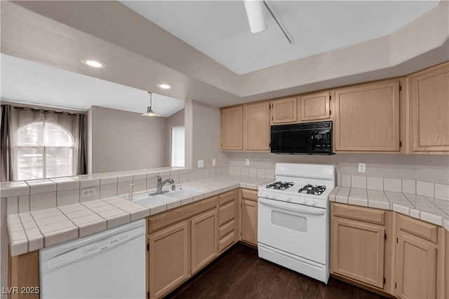 7950 W Flamingo Rd Unit 2019, Las Vegas, NV 89147 - kitchen featuring white appliances, a sink, recessed lighting, and light brown cabinetry