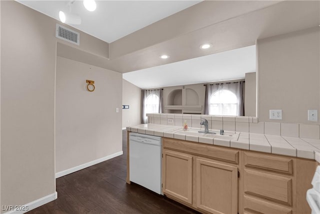 7950 W Flamingo Rd Unit 2019, Las Vegas, NV 89147 - kitchen featuring visible vents, a healthy amount of sunlight, a sink, white dishwasher, and dark wood-style flooring
