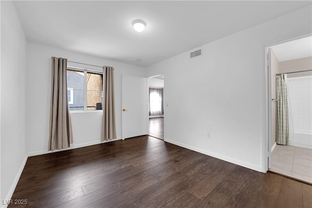 7950 W Flamingo Rd Unit 2019, Las Vegas, NV 89147 - interior space with wood finished floors, visible vents, and baseboards