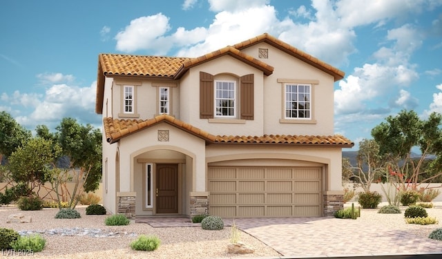 3446 Cromford Dr, North Las Vegas, NV 89081 - mediterranean / spanish house featuring stucco siding, a tile roof, decorative driveway, stone siding, and a garage
