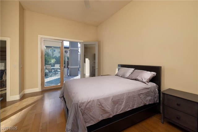 1520 Macdonald Ranch Dr, Henderson, NV 89012 - bedroom with ceiling fan, vaulted ceiling, wood finished floors, baseboards, and access to outside