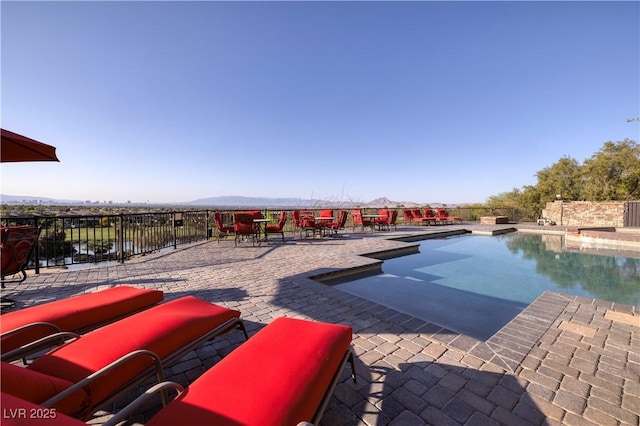 1520 Macdonald Ranch Dr, Henderson, NV 89012 - view of pool with a mountain view, a patio area, and a fenced in pool