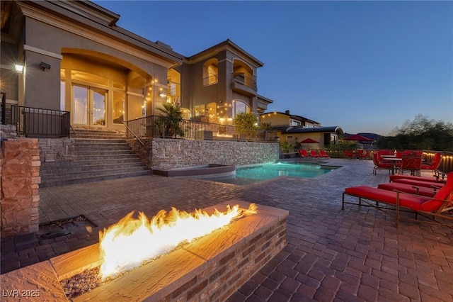 1520 Macdonald Ranch Dr, Henderson, NV 89012 - view of pool with a patio area, an outdoor fire pit, a fenced in pool, and stairs