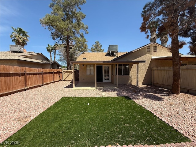 5653 White Cap St, Las Vegas, NV 89110 - rear view of property with a patio, central air condition unit, and stucco siding